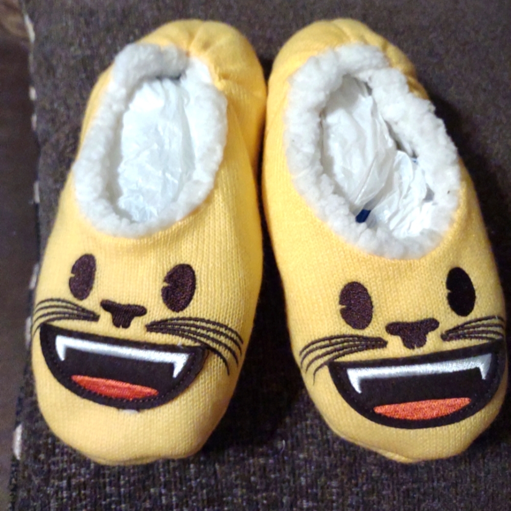 Emoji, smile face with a cushioned plush inside.